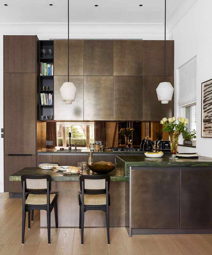 Kitchen styling on a countertop in a metallic kitchen