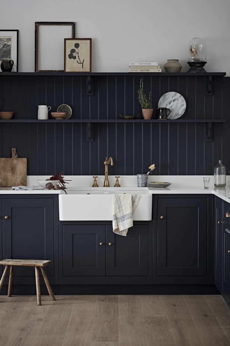 Kitchen with charcoal cabinets and open shelving