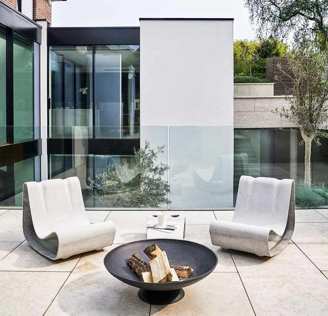 Outdoor tile on patio with glass extension