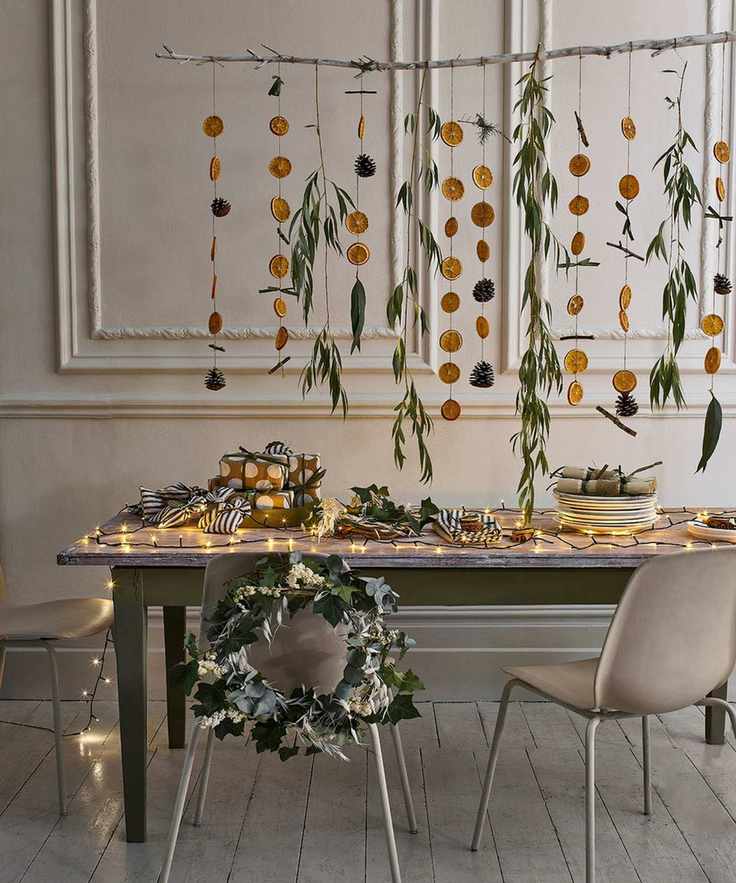 Hanging decorations with oranges and leaves