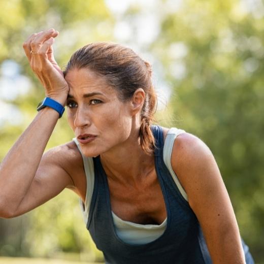 Woman sweating from workout