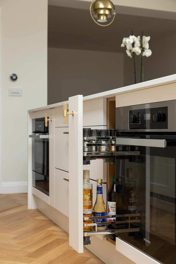 spice storage drawer integrated within custom cabinetry