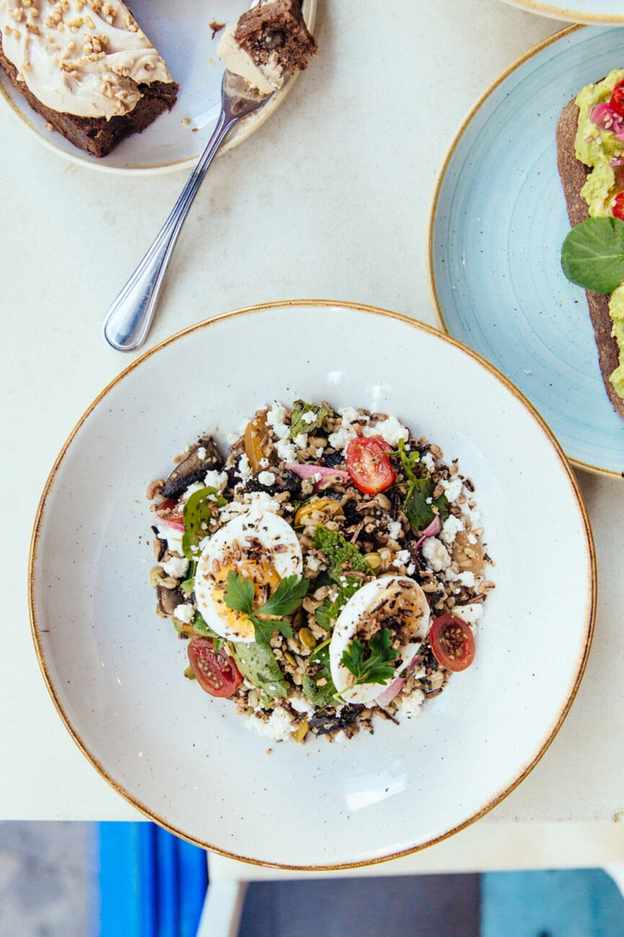 Veggie grain bowl with spring garlic cashew pesto.