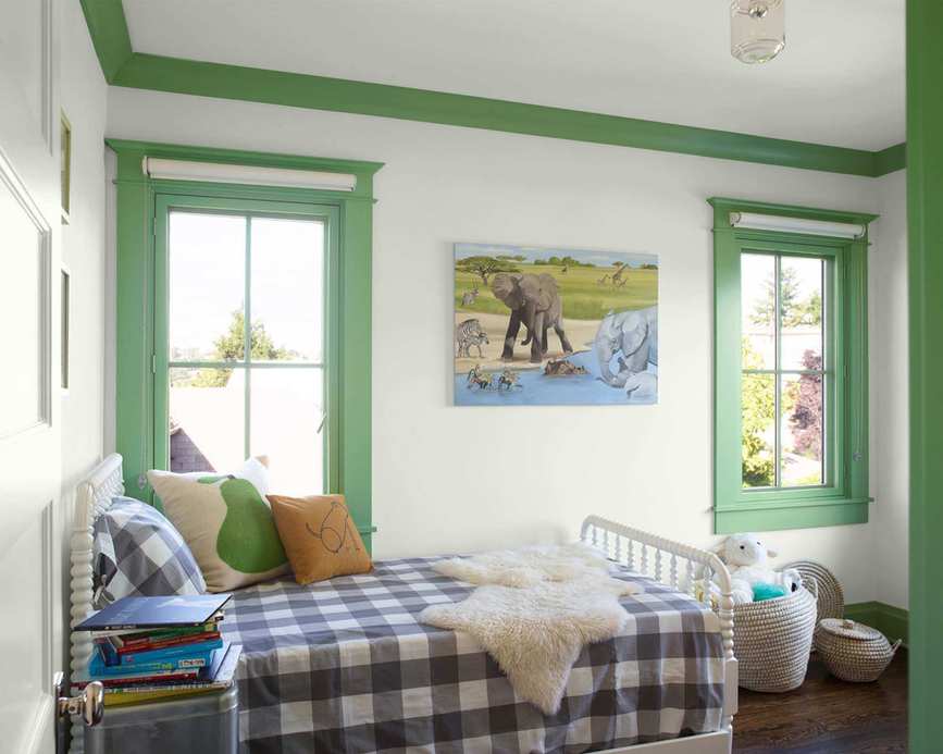 Children's bedroom with vibrant ceiling and window trim