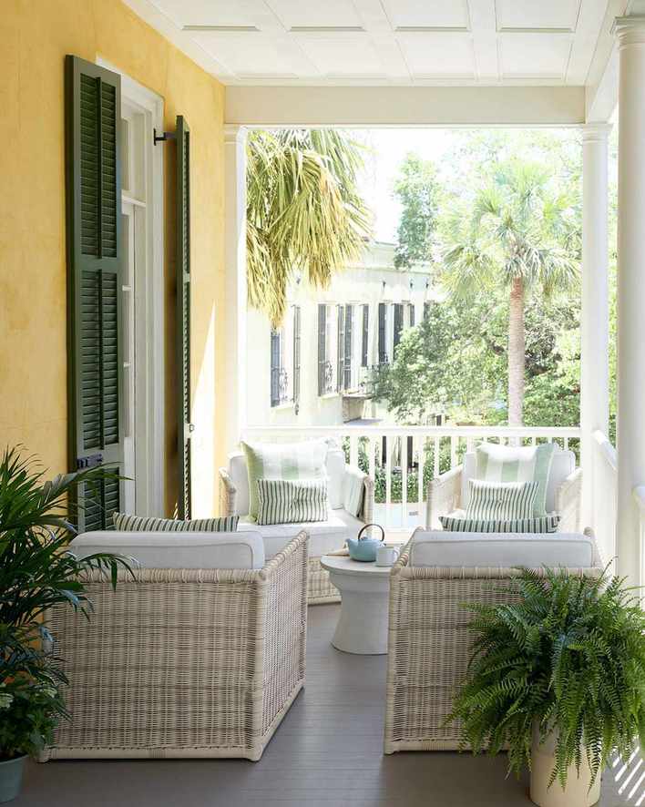 Charming front porch with elegant paneling