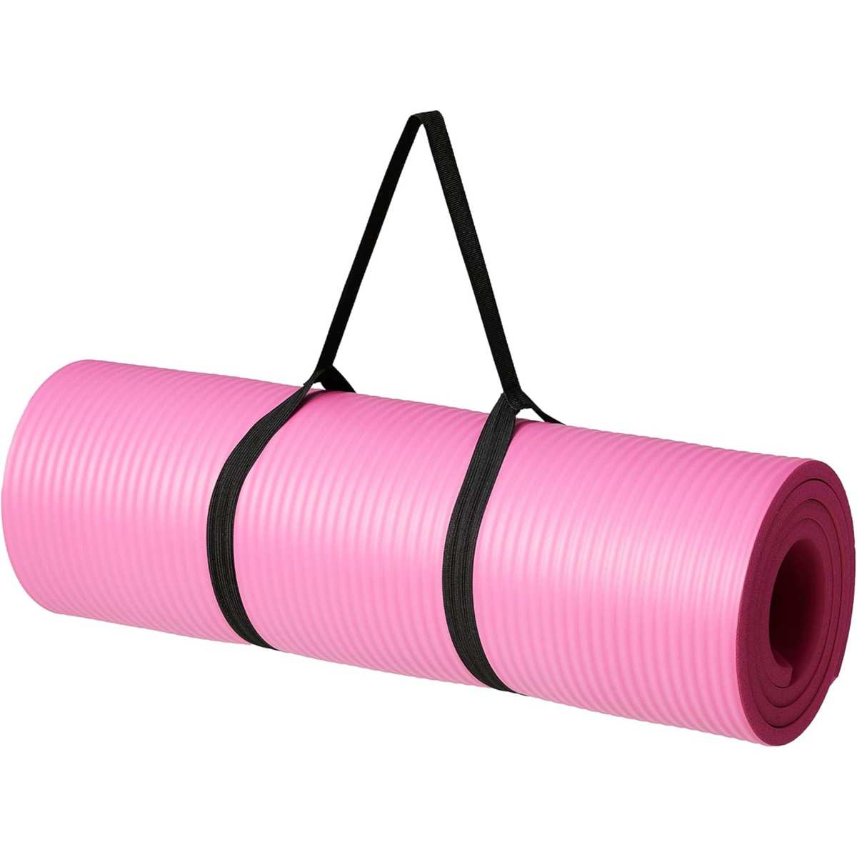 A rolled bright pink yoga mat with black straps