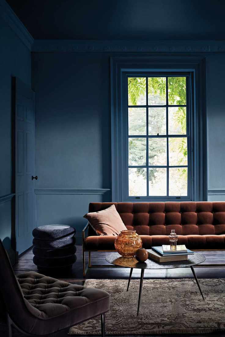 Living room painted in Indulgence dark blue paint by Crown