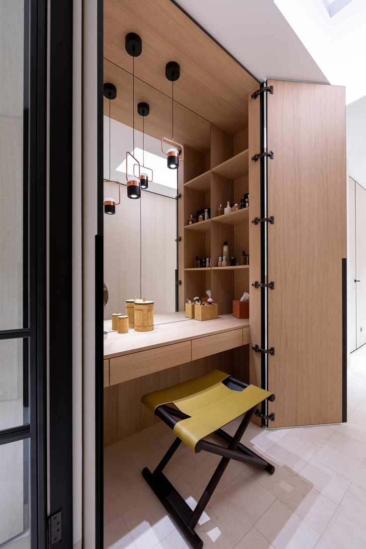 dressing room enclosed in bespoke wardrobes
