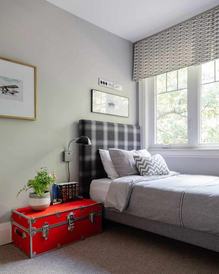 Gray boy's bedroom with vibrant accents