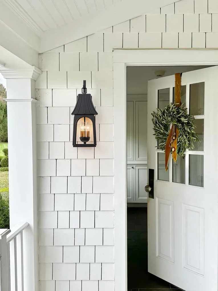 outdoor light on white house