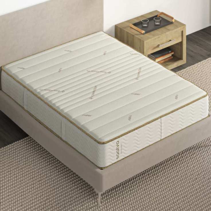 A Saatva Zenhaven Mattress in a modern room