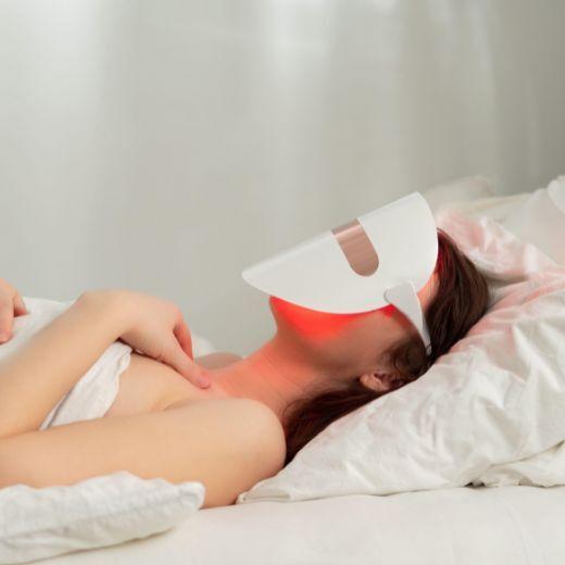 Woman with at-home LED Mask on face