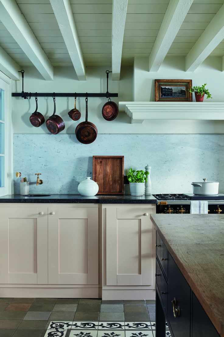 Pale pink kitchen with marble splashback