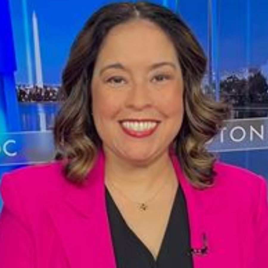 Kelly Johnson Arbor in a pink blazer