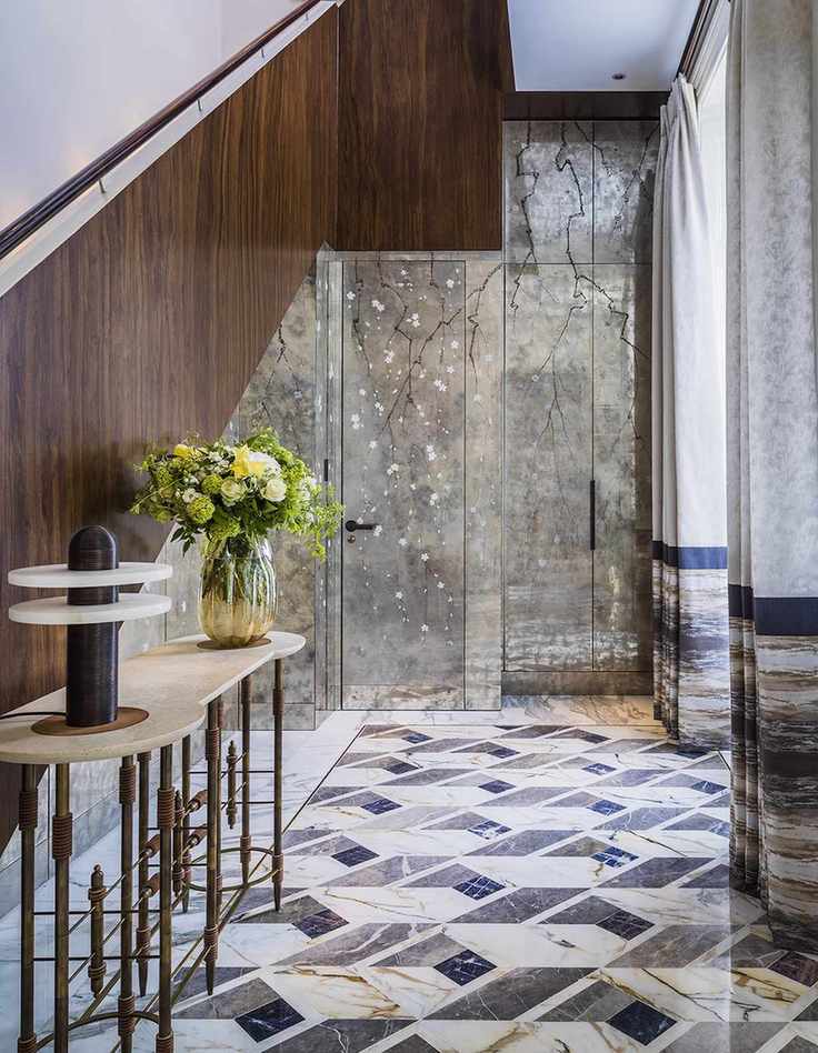 Luxurious entryway with geometric marble floor