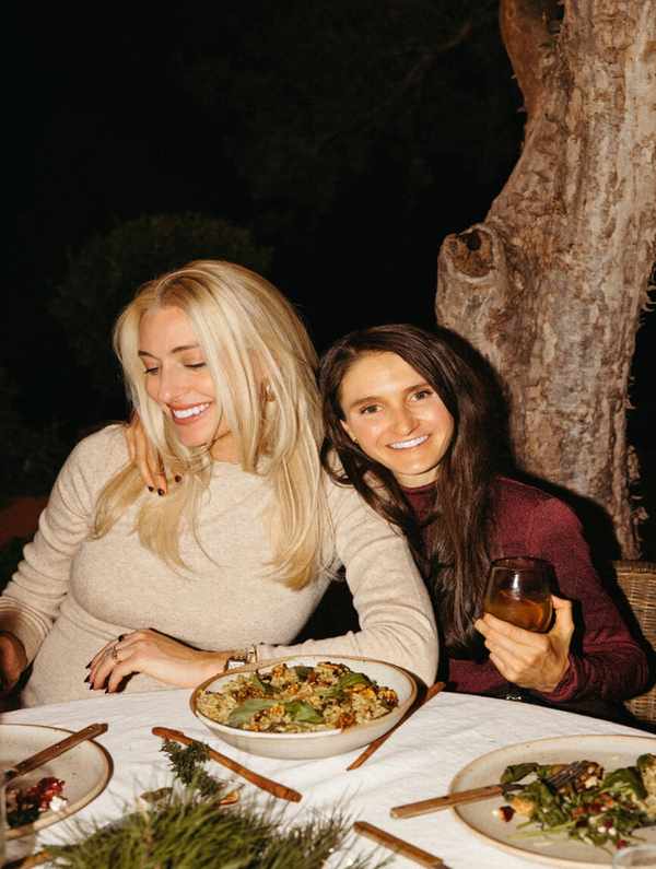 Friends at holiday backyard dinner party