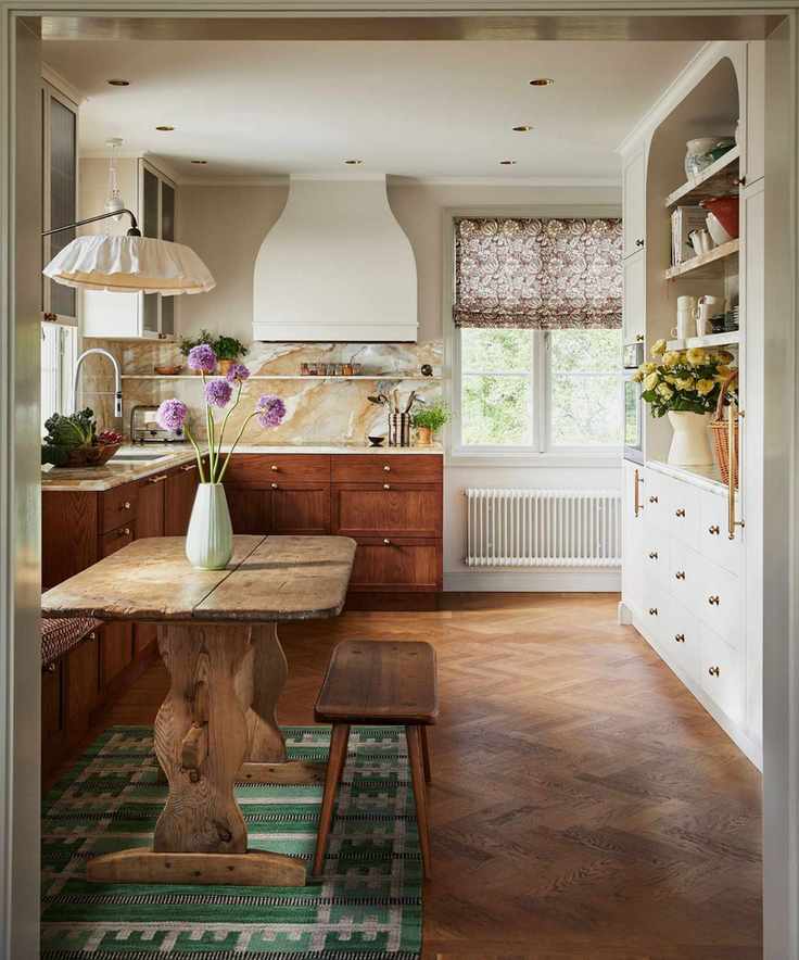 Modern farmhouse kitchen lighting above a farmhouse table