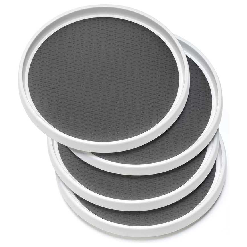 A stack of three gray and white Lazy Susan turntables