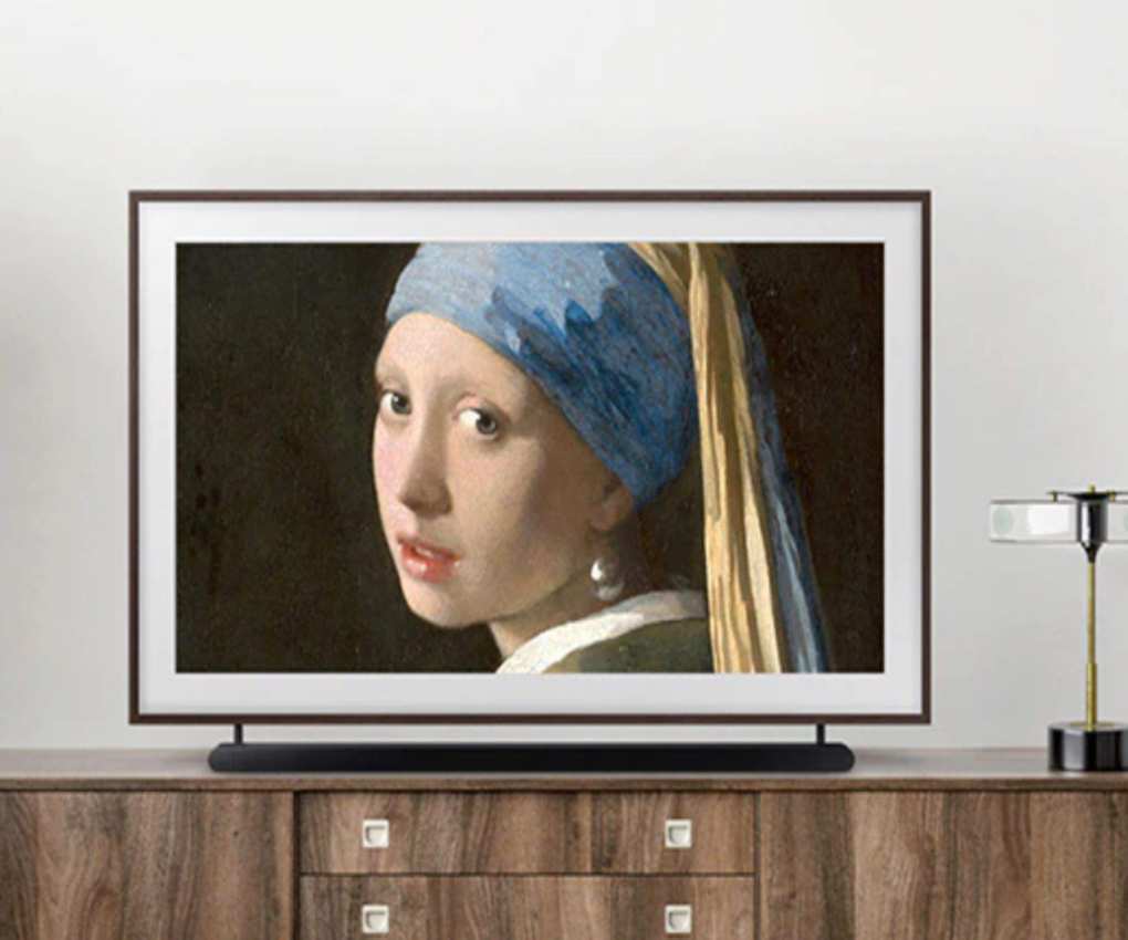 A smart TV on a hallway sideboard