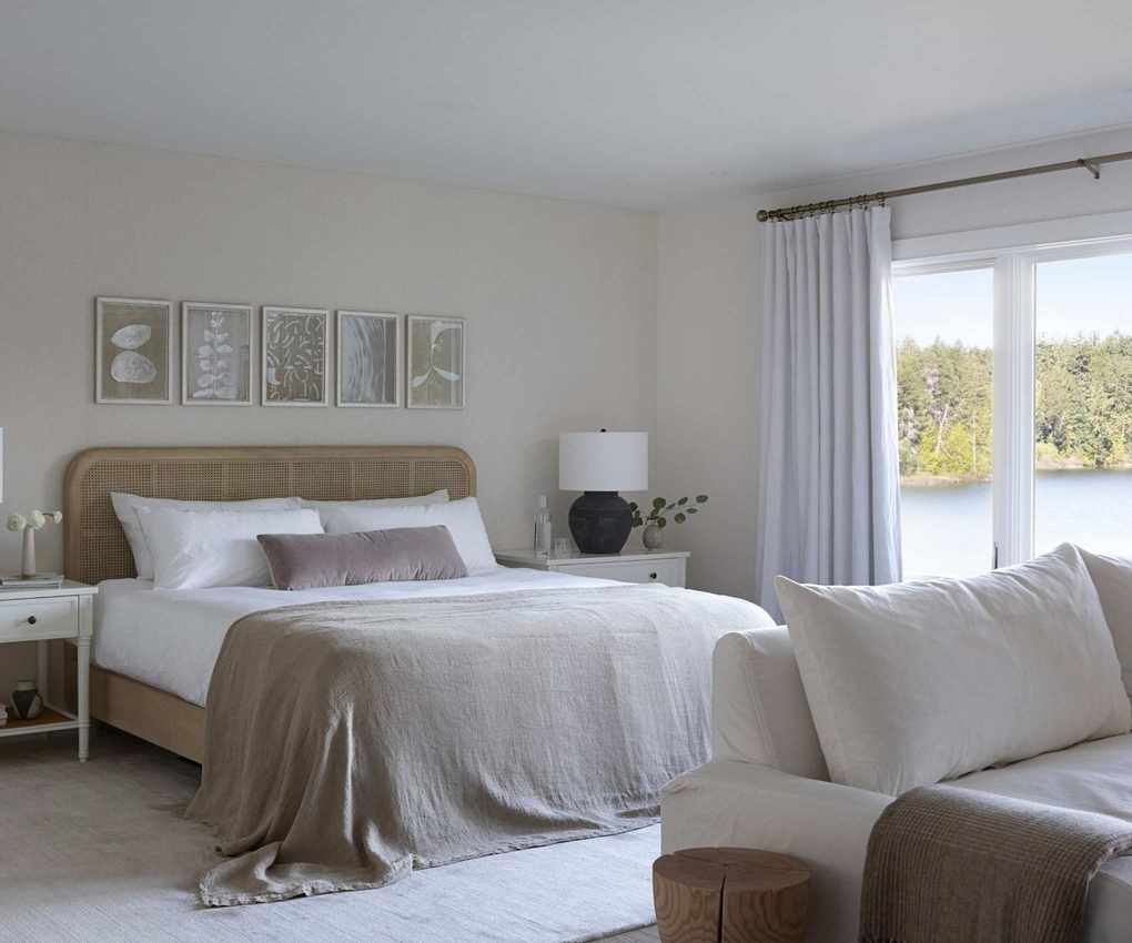 bedroom with view of lake