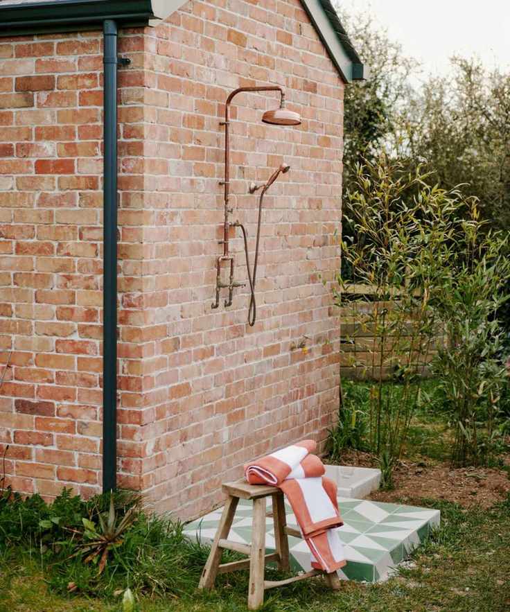 Shower attached to the wall of a property