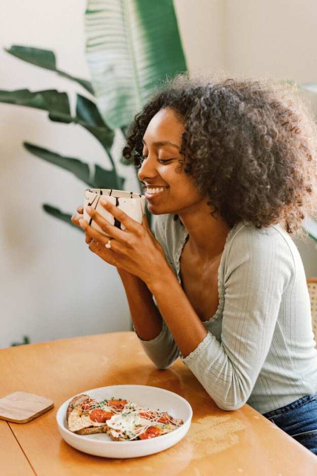 Woman drinking tea_how to stimulate vagus nerve