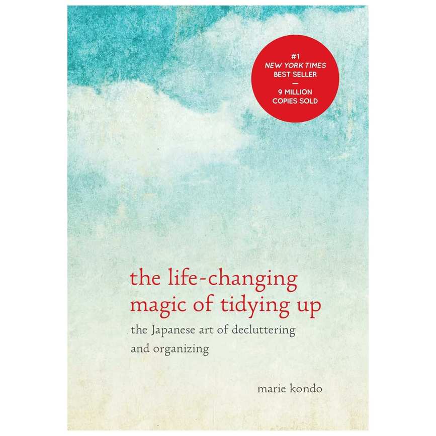 A blue copy of the life-changing magic of tidying up with red title text