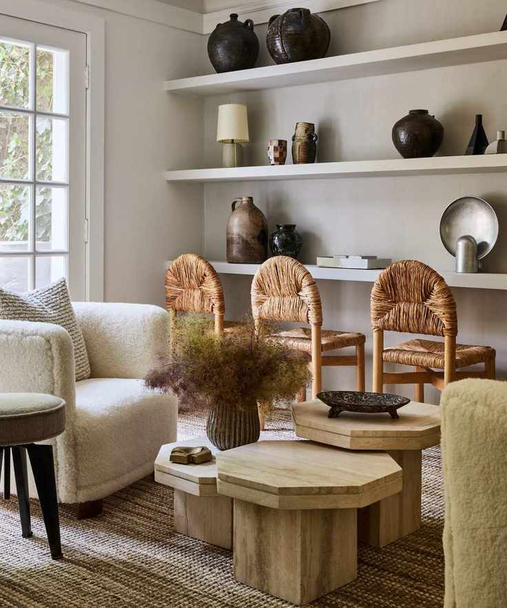 Wooden chairs, wooden tables,, fluffy armchairs, black pots