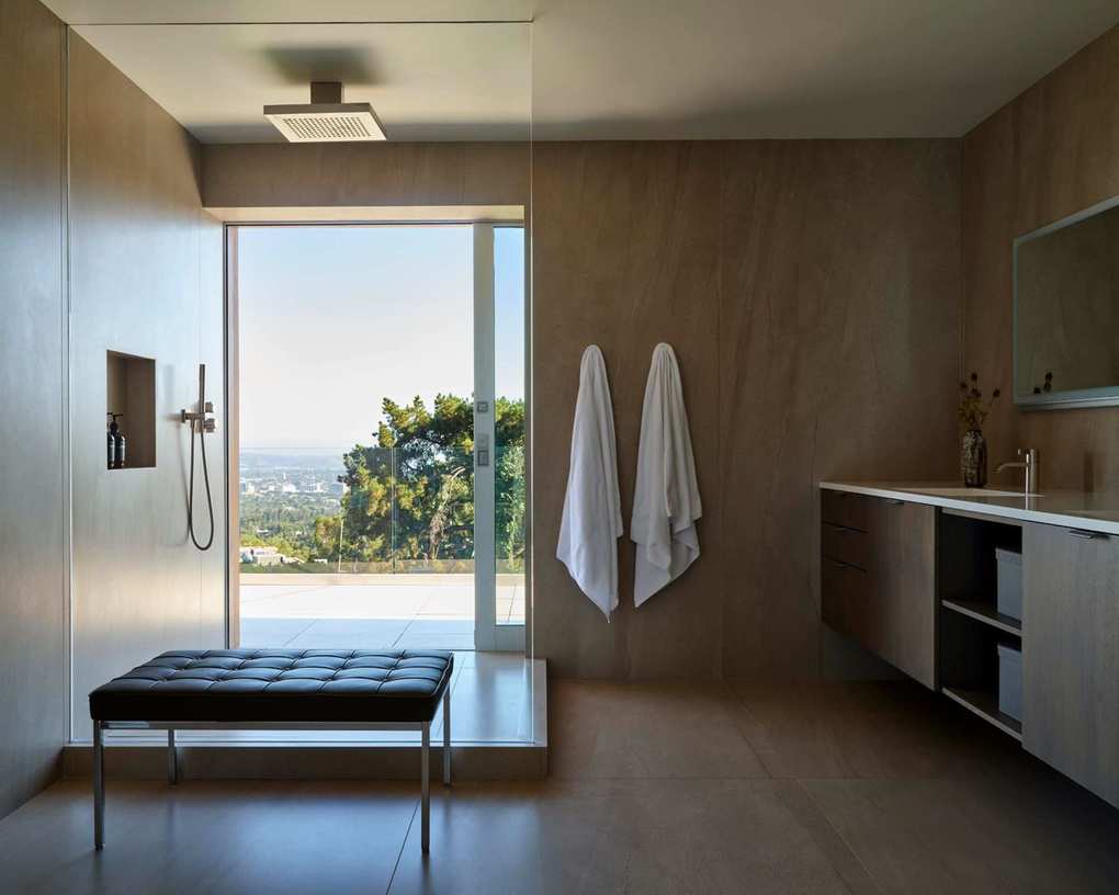 Midcentury bathroom featuring a large floor-to-ceiling window