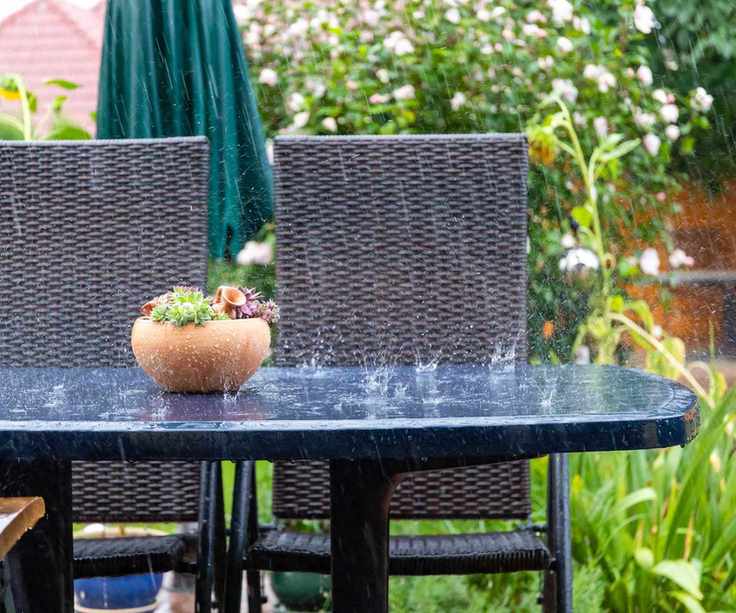 outdoor furniture in rain