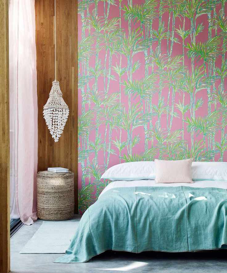 vibrant palm botanical leaf wallpaper in bedroom