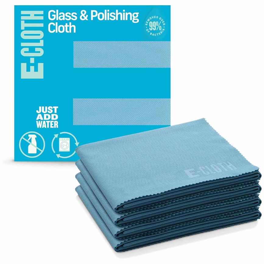 A stack of blue glass and polishing cloths next to a blue packaging box with white text