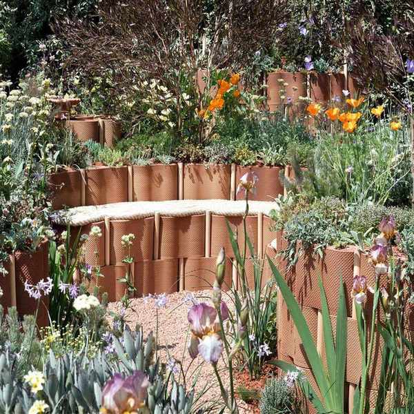 circular raised beds made from perforated clay