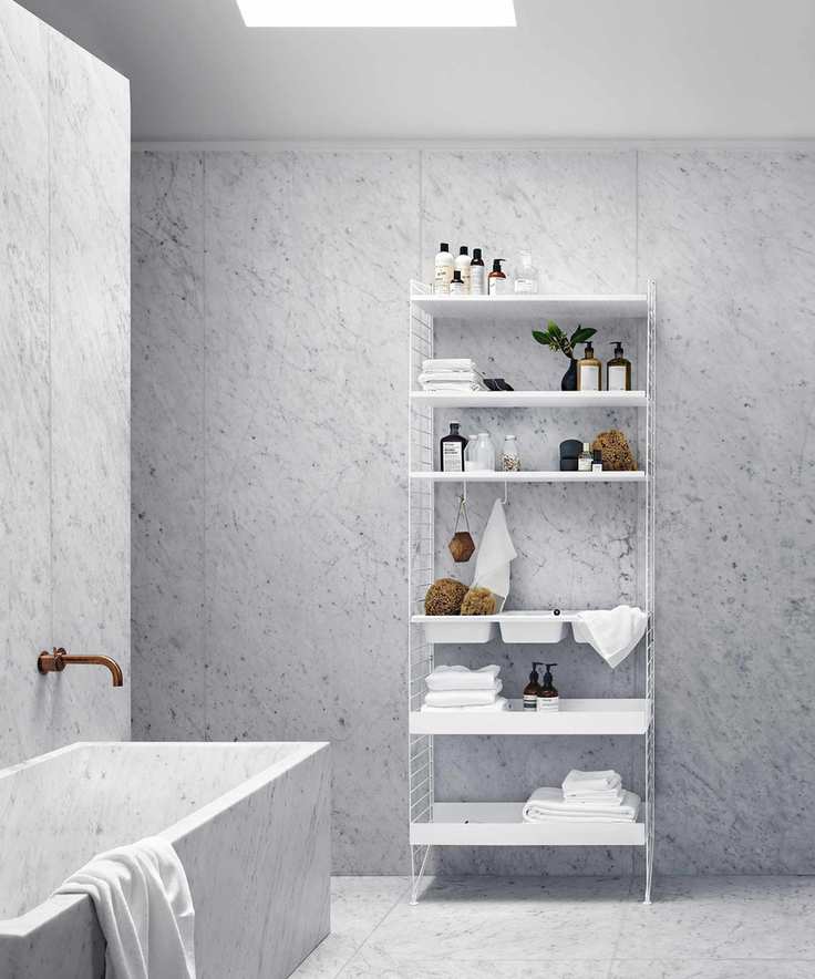 Minimalist bathroom with modular shelving