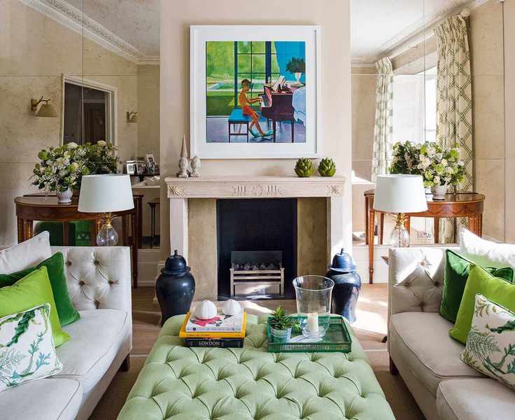 Living room with fireplace with facing sofas and ottoman