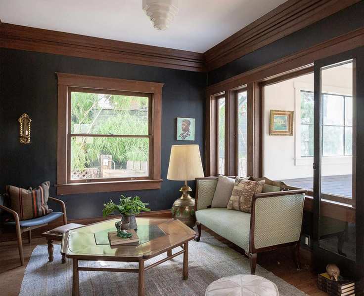 Traditional living room with dark wood trims