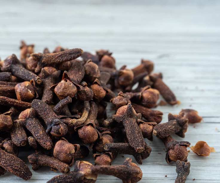 Clove spice on a white table