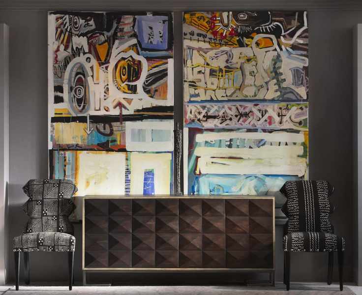 A modern hallway showcasing abstract artwork