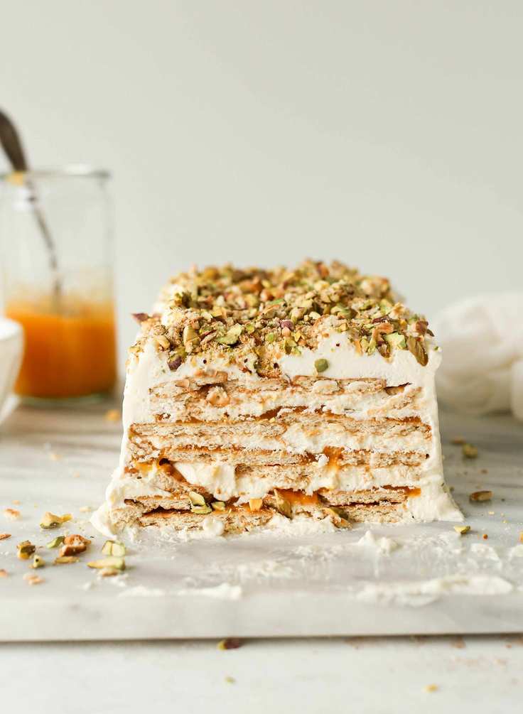 Mango and cardamom cream icebox cake with salty pistachio crumble