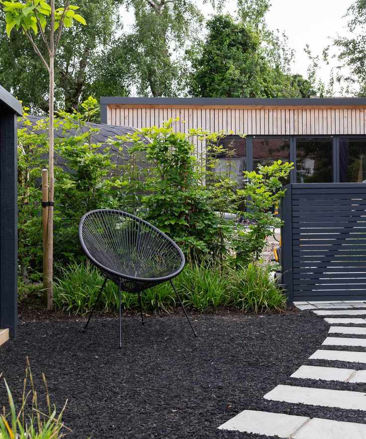 Scandi-style garden design with path and seat