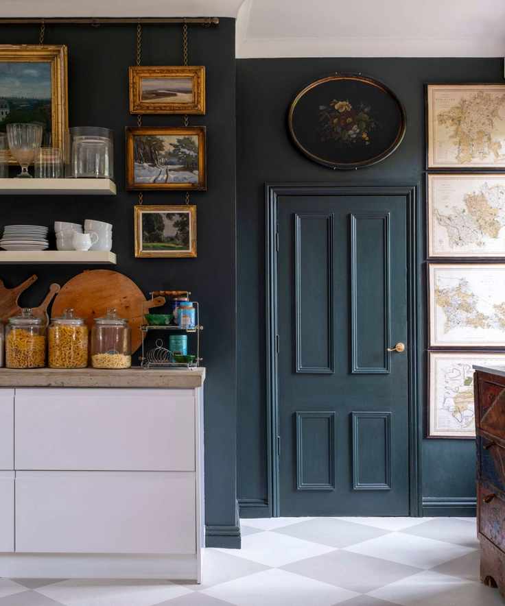 Kitchen adorned with vintage artwork