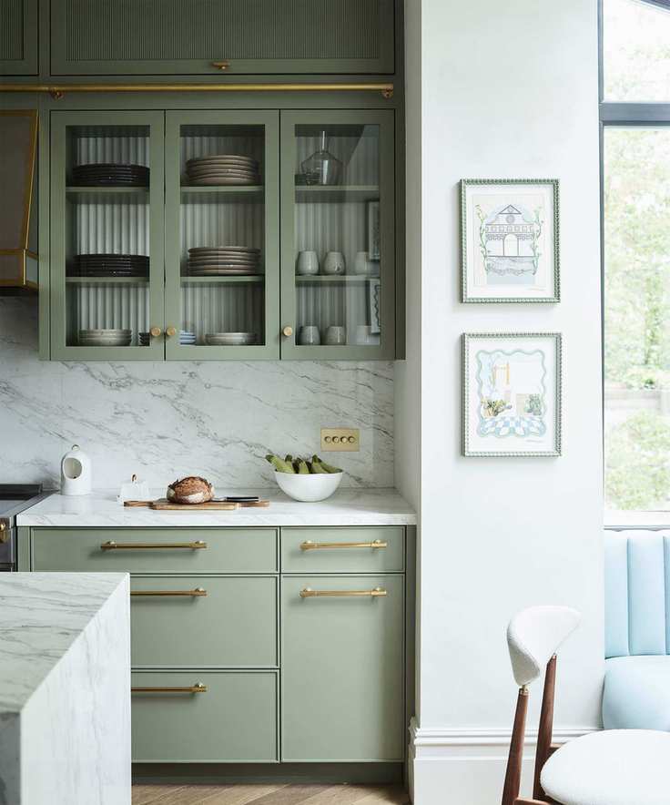 Kitchen with sage green cabinetry