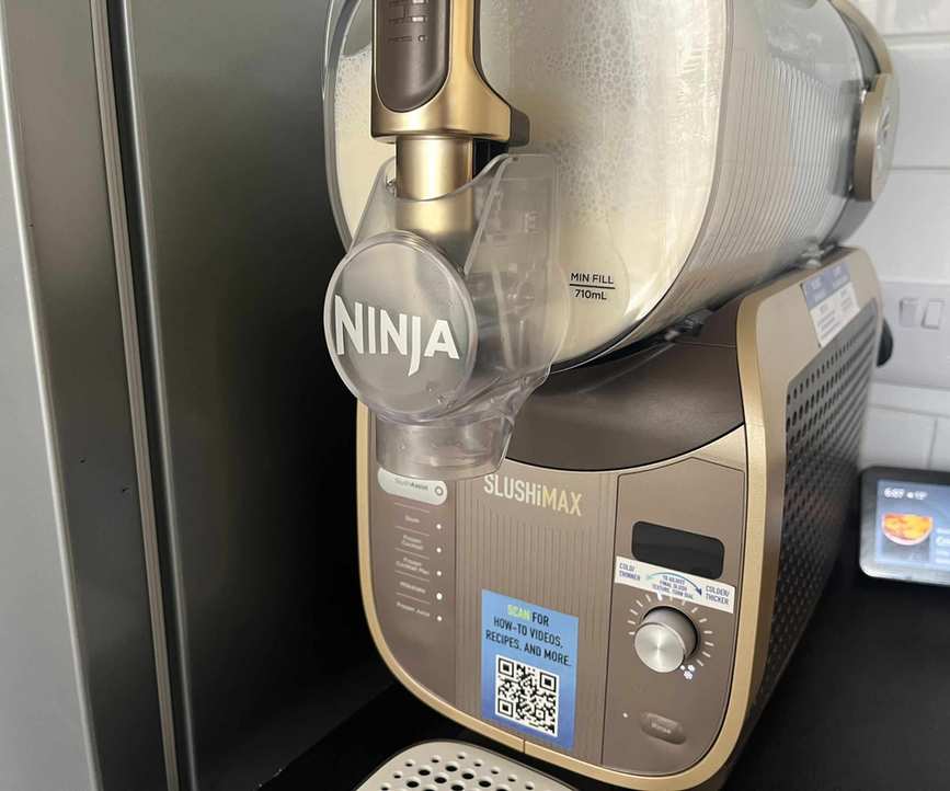 Milkshake mixture being mixed in the Ninja SLUSHi Max.