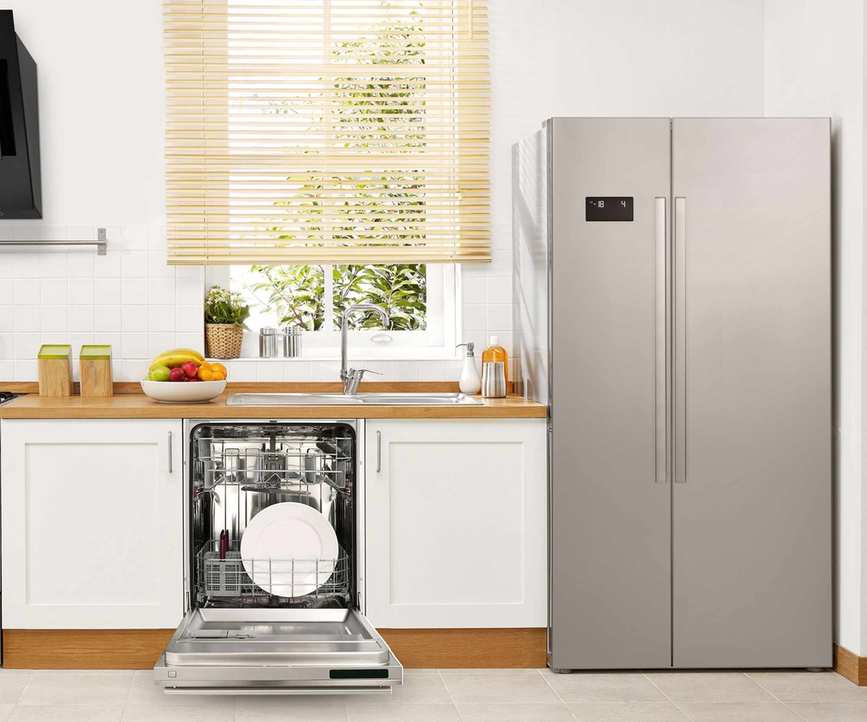 A dishwasher under a sink