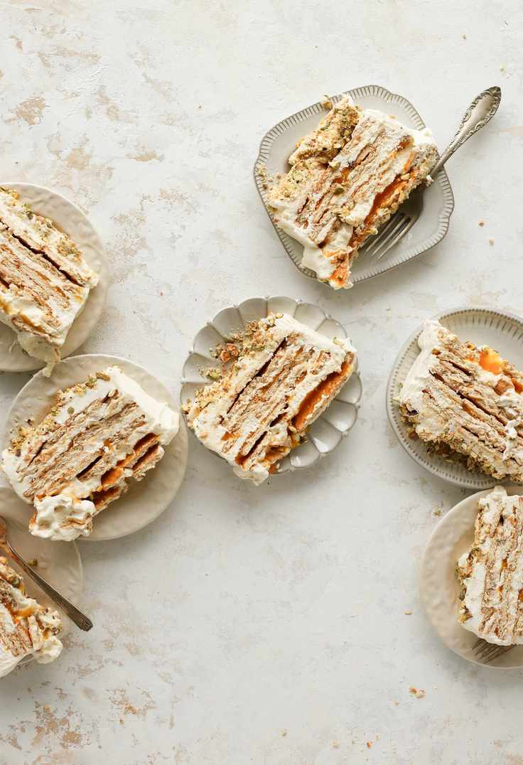 Mango and cardamom cream icebox cake with salty pistachio crumble