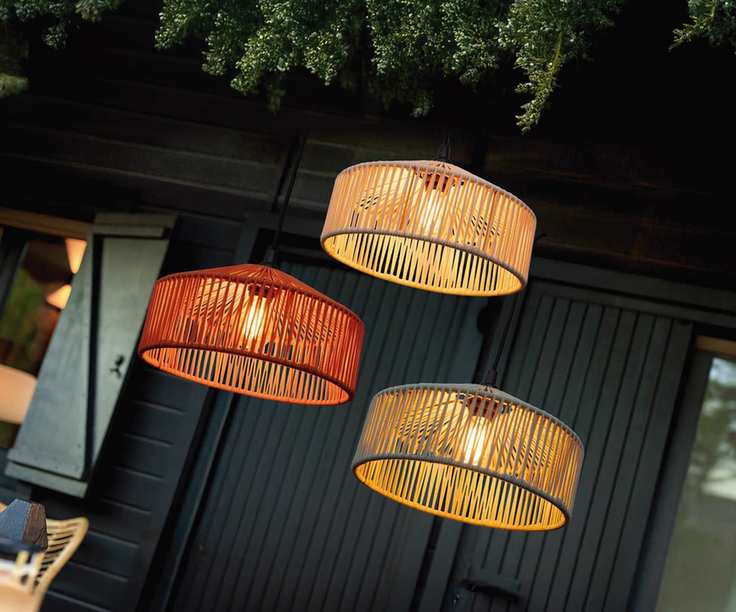 CALABARDINA lights in a garden seating area