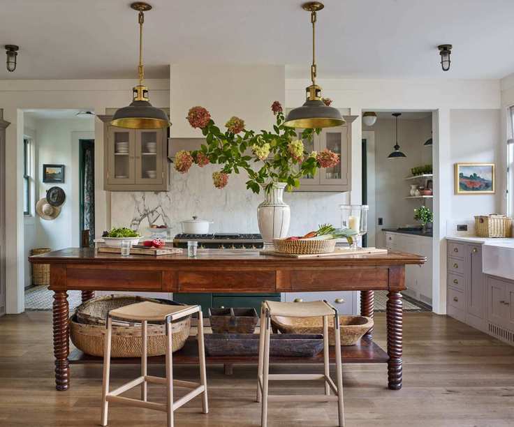 A midimalist kitchen showcasing neutral tones and layered textures