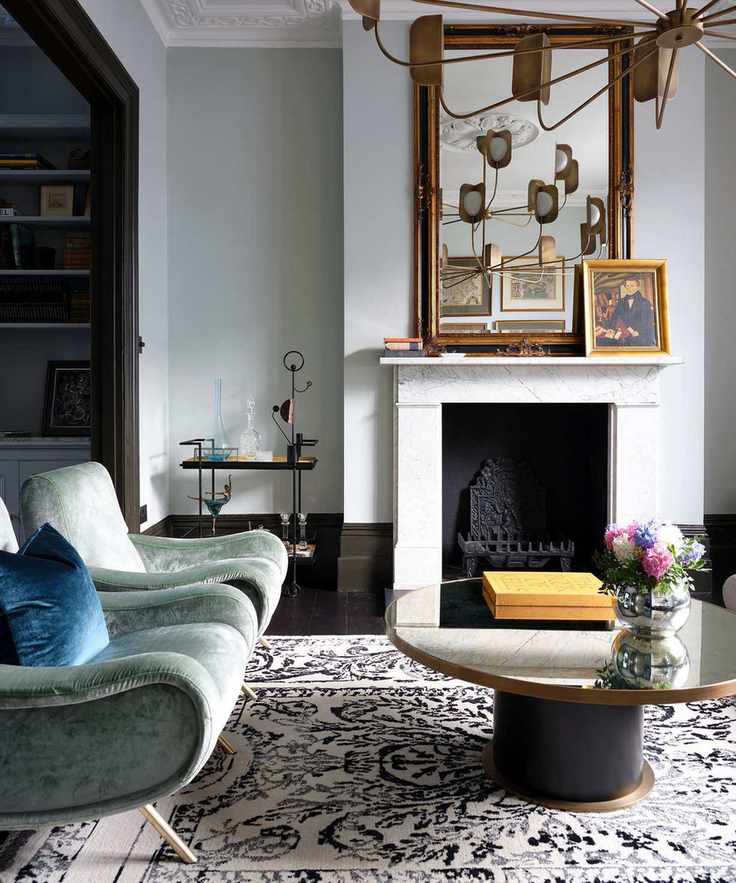 Modern living room with green chairs