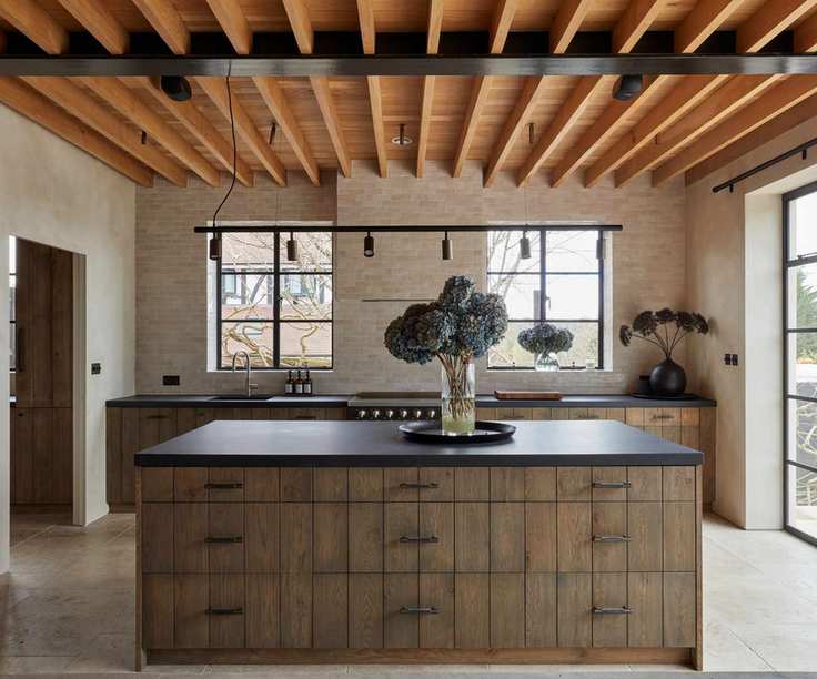 Black countertops with wood cabinetry