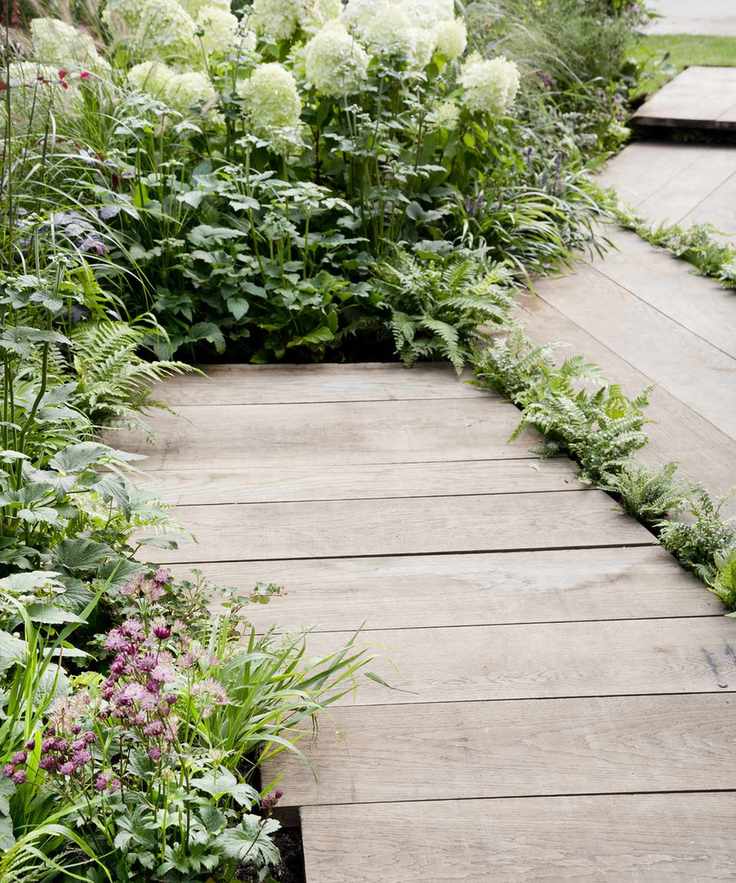 Permeable decking with gaps in between for planting and drainage